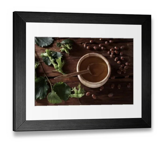Framed Print : A bowl of hazelnut oil and some ripe and unripe hazelnuts (Corylus avellana) on rustic wooden boards Framed Print : A bowl of hazelnut oil and some ripe and unripe hazelnuts (Corylus avellana) on rustic wooden boards