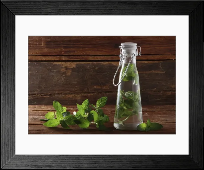 Framed Print : Pepperming leaves (Mentha piperita), preparation for making medicine or liquor, on a rustic wooden underground Framed Print : Pepperming leaves (Mentha piperita), preparation for making medicine or liquor, on a rustic wooden underground
