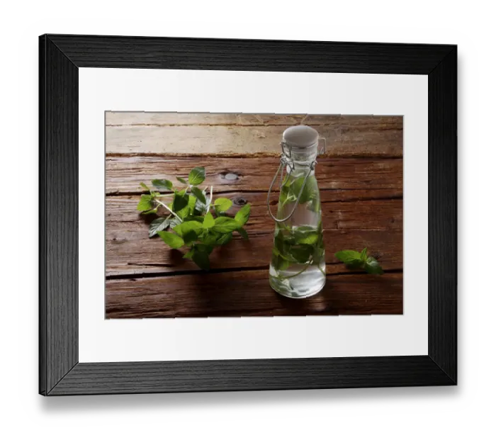 Framed Print : Pepperming leaves (Mentha piperita), preparation for making medicine or liquor, on a rustic wooden underground