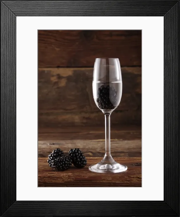 Framed Print : Glass of Blackberry schnapps with Blackberries (Rubus sectio Rubus) in front of rustic wood Framed Print : Glass of Blackberry schnapps with Blackberries (Rubus sectio Rubus) in front of rustic wood