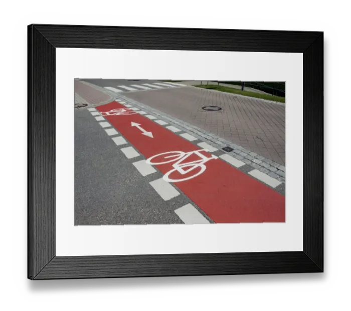 Framed Print : Bicycle path marked with red Framed Print : Bicycle path marked with red