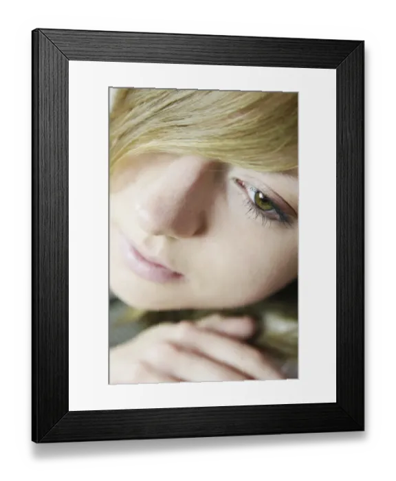 Framed Print : Portrait of a young woman, hair in her face, hand Framed Print : Portrait of a young woman, hair in her face, hand