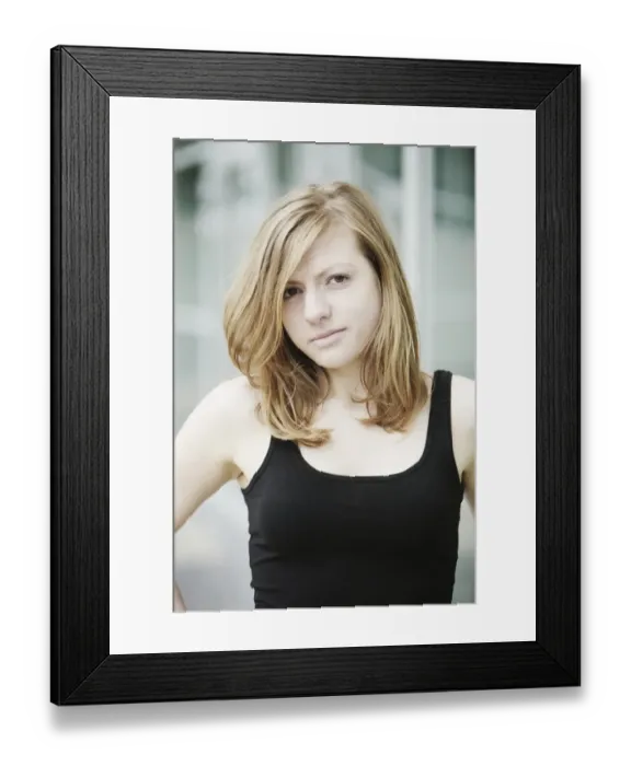 Framed Print : Sensual portrait of a young long-haired woman in a black tank top Framed Print : Sensual portrait of a young long-haired woman in a black tank top