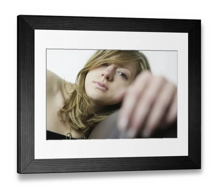 Framed Print : Portrait of a young woman with long hair, sensual, blurry hand Framed Print : Portrait of a young woman with long hair, sensual, blurry hand