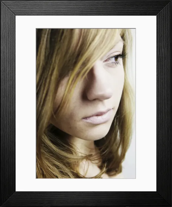 Framed Print : Portrait of a young woman with long hair Framed Print : Portrait of a young woman with long hair