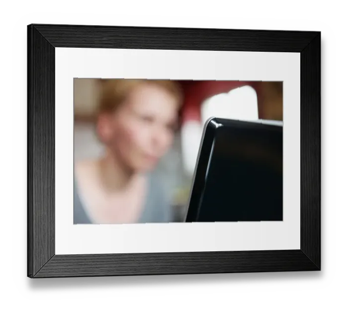 Framed Print : Woman at a laptop Framed Print : Woman at a laptop