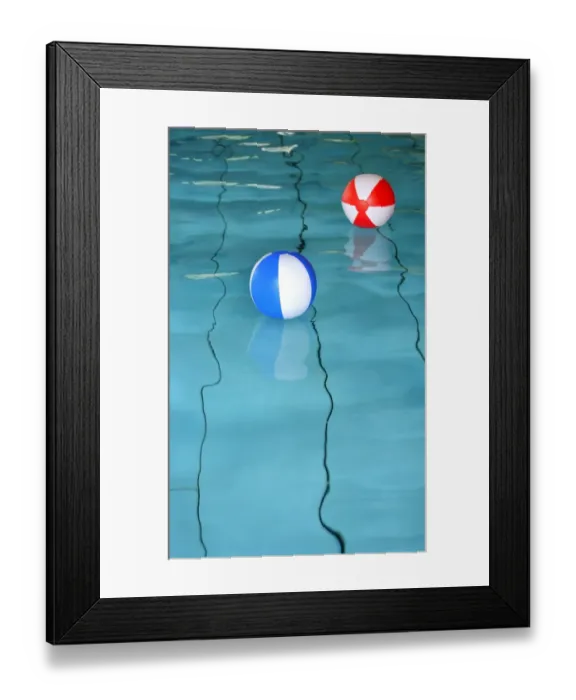 Framed Print : Two beach balls in a swimming pool Framed Print : Two beach balls in a swimming pool