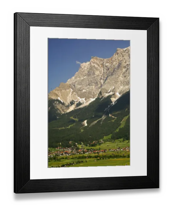 Framed Print : The limestone wall of Mt. Zugspitze with the top station of the Tyrolean Zugspitze Cable Cartowers above the valley town of Ehrwald, Wettersteingebirge range, Tyrol, Austria, Europe Framed Print : The limestone wall of Mt. Zugspitze with the top station of the Tyrolean Zugspitze Cable Cartowers above the valley town of Ehrwald, Wettersteingebirge range, Tyrol, Austria, Europe