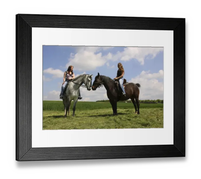 Framed Print : Two young women riding on horseback, Bavaria, Germany, Europe