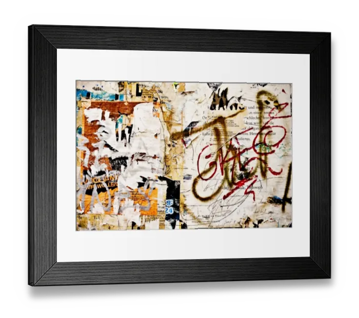 Framed Print : Torn bills on a billboard
