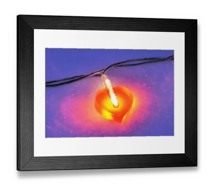 Framed Print : Lit heart-shaped fairy lights in the snow Framed Print : Lit heart-shaped fairy lights in the snow
