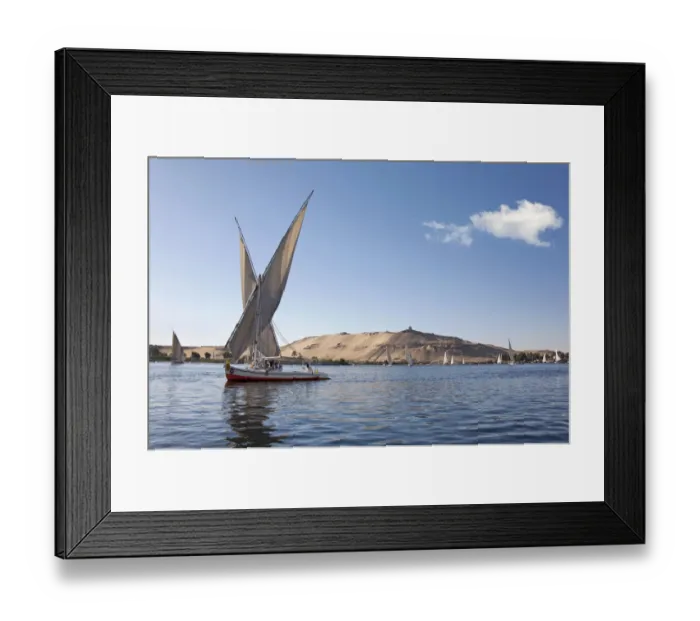 Framed Print : Felucca, a traditional wooden sailing boat, on the Nile, Aswan, Egypt, Africa Framed Print : Felucca, a traditional wooden sailing boat, on the Nile, Aswan, Egypt, Africa