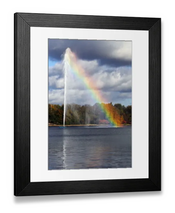 Framed Print : Alster Fountain, water fountain creating a rainbow on the Inner Alster Lake in the center of Hamburg, Germany, Europe Framed Print : Alster Fountain, water fountain creating a rainbow on the Inner Alster Lake in the center of Hamburg, Germany, Europe