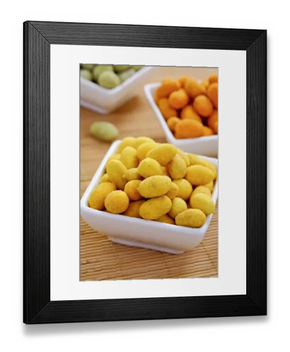 Framed Print : Various coated peanuts, curry, Wasabi and chili flavours Framed Print : Various coated peanuts, curry, Wasabi and chili flavours