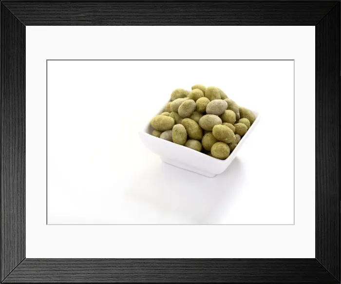 Framed Print : Peanuts in a Wasabi flavoured coating, in a bowl Framed Print : Peanuts in a Wasabi flavoured coating, in a bowl