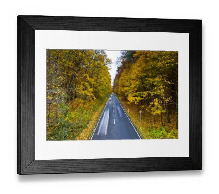 Framed Print : Cars driving on a country road in autumn, Hesse, Germany, Europe Framed Print : Cars driving on a country road in autumn, Hesse, Germany, Europe