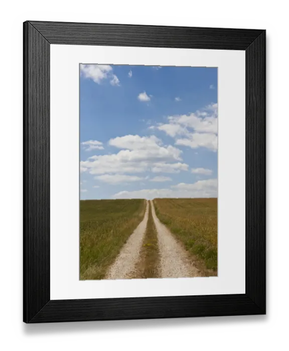 Framed Print : Straight dirt road through fields Framed Print : Straight dirt road through fields