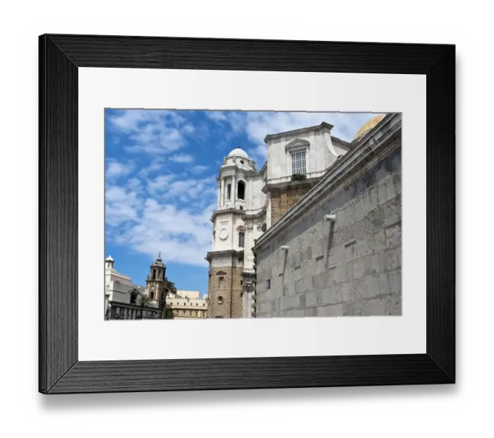 Framed Print : Side view of the cathedral in front of the Iglesias Santiago Apostol Church in the Andalusian city of Cadiz, Spain, Europe Framed Print : Side view of the cathedral in front of the Iglesias Santiago Apostol Church in the Andalusian city of Cadiz, Spain, Europe