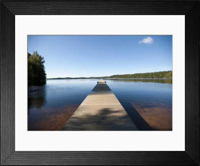 Framed Print : Wooden landing stage leading towards a vast lake, Sweden, Europe Framed Print : Wooden landing stage leading towards a vast lake, Sweden, Europe