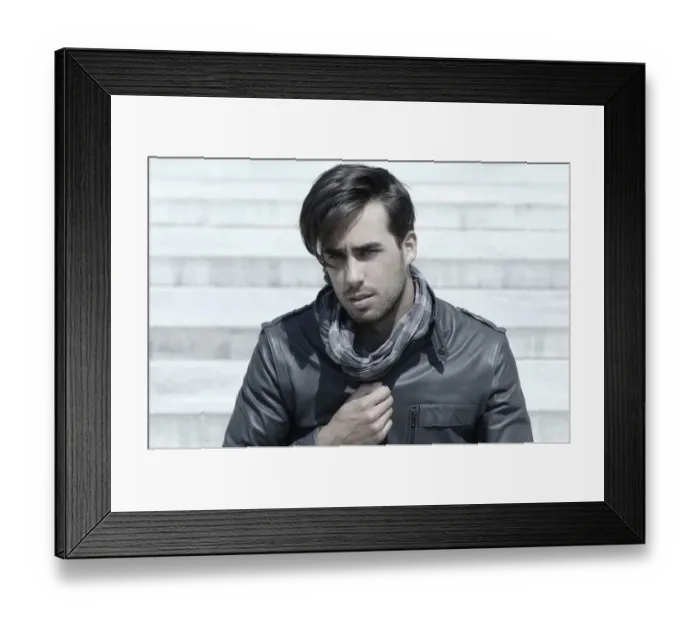 Framed Print : Young man wearing a leather jacket in front of an open staircase, portrait of a young rocker Framed Print : Young man wearing a leather jacket in front of an open staircase, portrait of a young rocker