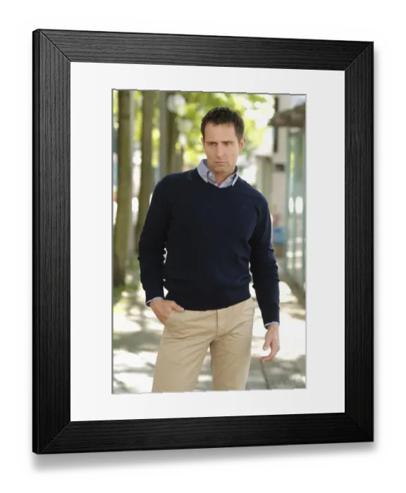Framed Print : Man wearing casual clothes standing in an avenue
