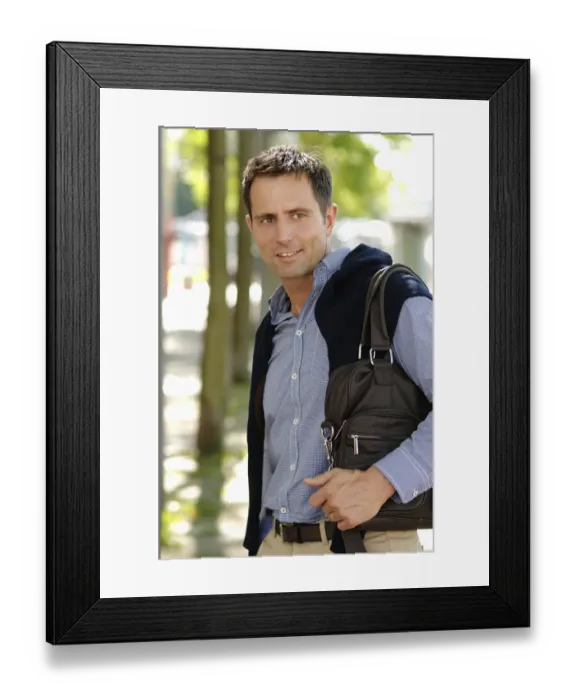 Framed Print : Man wearing casual clothes standing in an avenue Framed Print : Man wearing casual clothes standing in an avenue
