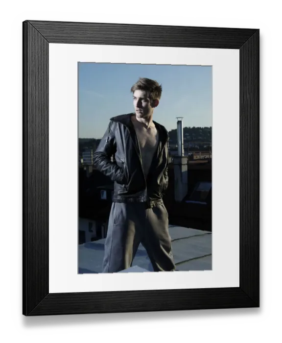 Framed Print : Young rebel in cool clothes on a roof at dusk Framed Print : Young rebel in cool clothes on a roof at dusk