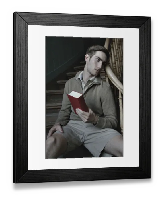 Framed Print : Man with book in a stairwell, nostalgic portrait Framed Print : Man with book in a stairwell, nostalgic portrait