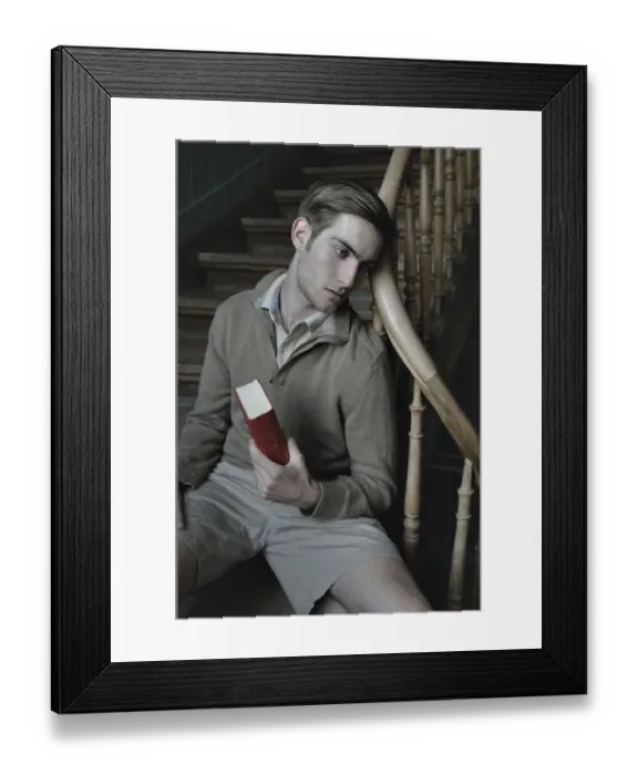 Framed Print : Man with book in a stairwell, nostalgic portrait