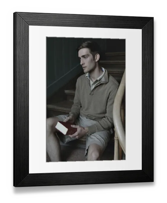 Framed Print : Man with book in a stairwell, nostalgic portrait