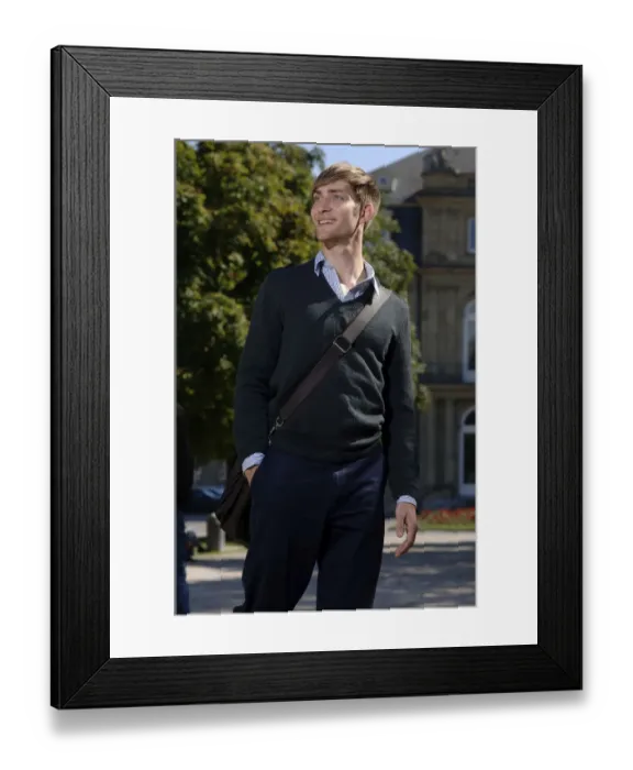 Framed Print : Young man wearing elegant clothing with a bag over his shoulder in front of the New Palace in Stuttgart, Baden-Wuerttemberg, Germany, Europe Framed Print : Young man wearing elegant clothing with a bag over his shoulder in front of the New Palace in Stuttgart, Baden-Wuerttemberg, Germany, Europe