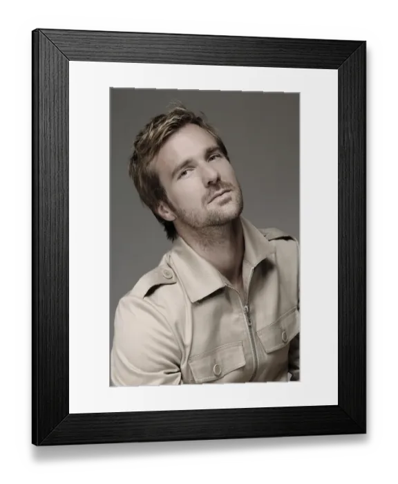 Framed Print : Man in his mid-thirties, beige shirt, portrait Framed Print : Man in his mid-thirties, beige shirt, portrait