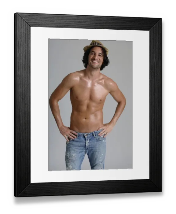 Framed Print : Athletic man, early 30s, bare-chested wearing jeans and a hat Framed Print : Athletic man, early 30s, bare-chested wearing jeans and a hat