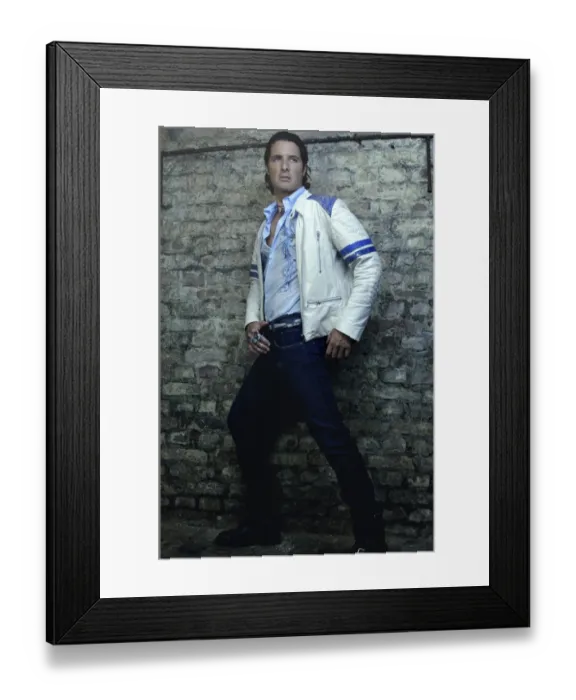 Framed Print : Man in his early thirties, wearing a leather jacket in a basement Framed Print : Man in his early thirties, wearing a leather jacket in a basement