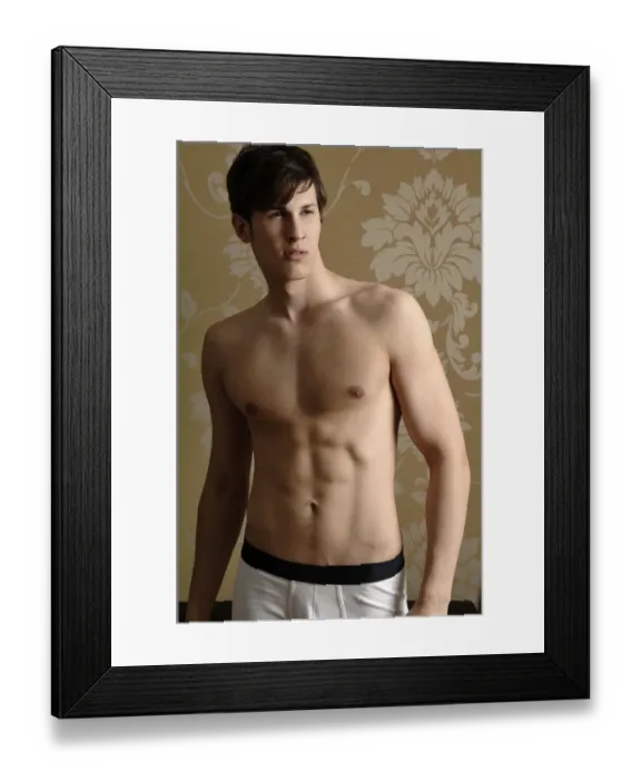 Framed Print : Young man wearing underwear standing in front of nostalgic wallpaper