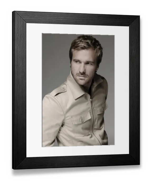 Framed Print : Man in his mid-thirties, beige shirt, portrait Framed Print : Man in his mid-thirties, beige shirt, portrait
