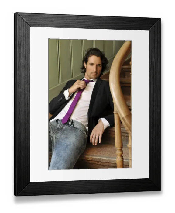 Framed Print : Young man sitting on the stairs Framed Print : Young man sitting on the stairs
