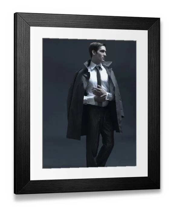 Framed Print : Fashion shot of a man in a suit and jacket Framed Print : Fashion shot of a man in a suit and jacket