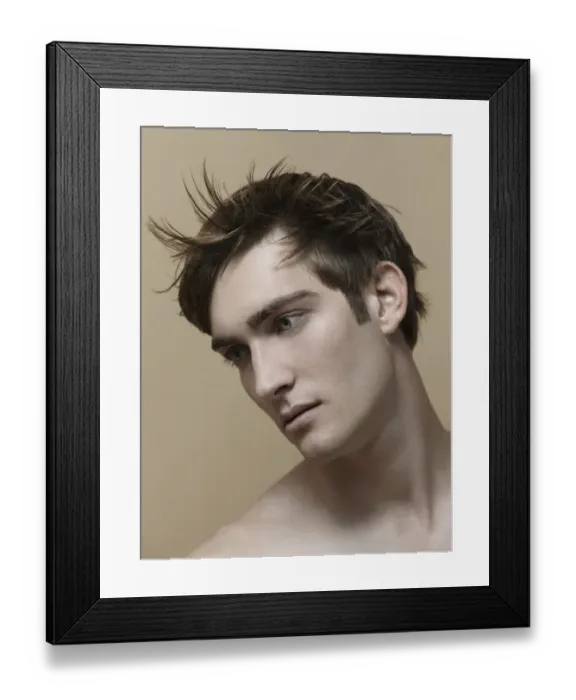 Framed Print : Beauty portrait of a young man with moving hair Framed Print : Beauty portrait of a young man with moving hair