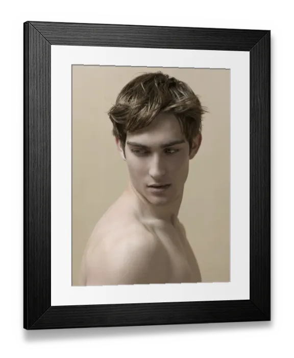 Framed Print : Beauty portrait of a young man with moving hair Framed Print : Beauty portrait of a young man with moving hair