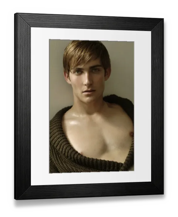 Framed Print : Portrait of a young man leaning on a wall Framed Print : Portrait of a young man leaning on a wall