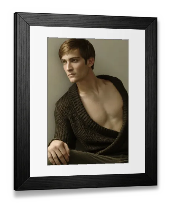 Framed Print : Portrait of a young man leaning on a wall Framed Print : Portrait of a young man leaning on a wall