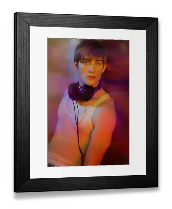 Framed Print : Young man in underwear with headphones in colorful lightYoung man in underwear with headphones in colorful light Framed Print : Young man in underwear with headphones in colorful lightYoung man in underwear with headphones in colorful light