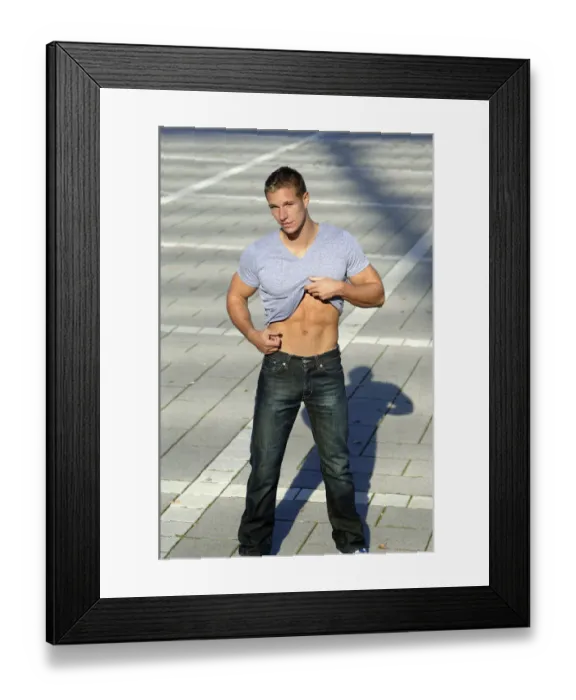 Framed Print : Young man undressing in the sunshine Framed Print : Young man undressing in the sunshine