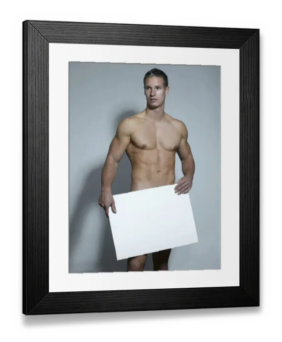 Framed Print : Naked man holding a blank sign in his hands