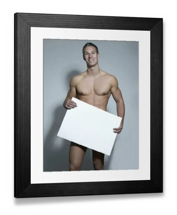 Framed Print : Naked man holding a blank sign in his hands