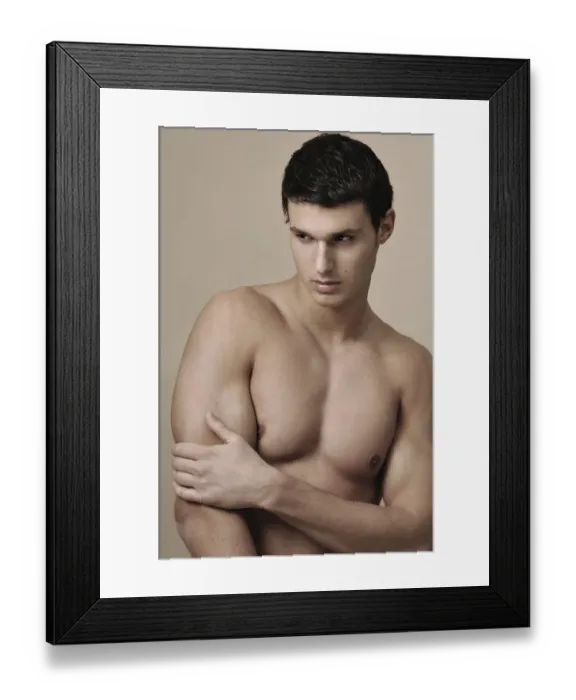 Framed Print : Portrait of a young man in warm tones