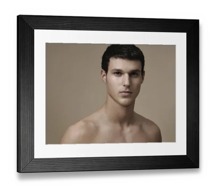 Framed Print : Portrait of a young man in warm tones