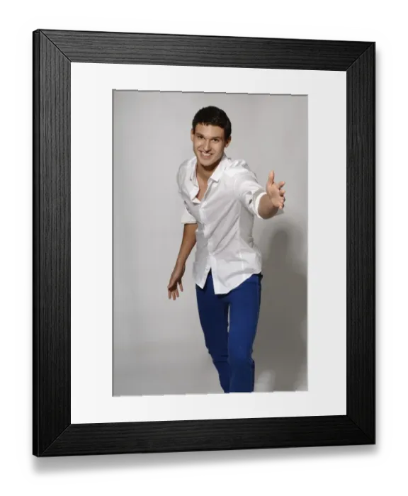 Framed Print : Young man in white shirt and blue jeans in movement Framed Print : Young man in white shirt and blue jeans in movement