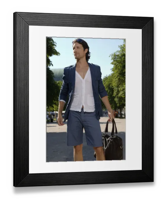 Framed Print : Long-haired man shopping in a city in the summer Framed Print : Long-haired man shopping in a city in the summer